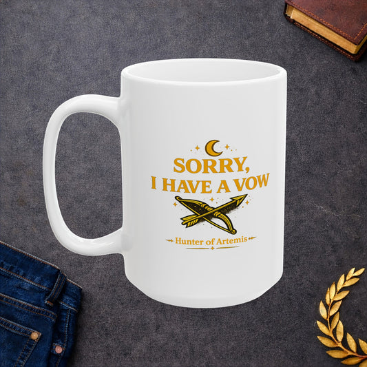 White ceramic mug with a mystical, gold-toned graphic against a dark background featuring the text "SORRY, I HAVE A VOW" in a bold serif font. A golden crescent moon and stars float above the words. Below the main text is a detailed illustration of a crossed bow and arrow surrounded by stardust sparkles, followed by the caption "Hunter of Artemis" framed by decorative gold accents.
