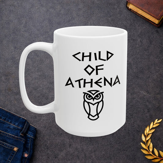 White ceramic mug graphic featuring bold ancient Greek-style lettering reading "Child of Athena" above a clean geometric line-art owl icon — referencing Athena, the Greek Goddess of Wisdom, whose sacred symbol is the owl, rendered in white on black in a striking high-contrast design.