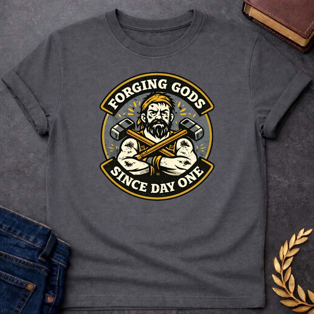 hephaestus forging gods since day one greek mythology youth t shirt featuring blacksmith hammer, forge sparks, fire god symbolism in industrial mythology design