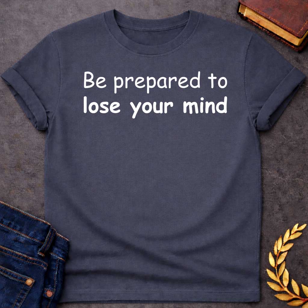 Dark Heather T-shirt graphic white text featuring large rounded friendly sans-serif text reading "Be prepared to lose your mind" — a humorous warning referencing Dionysus, the Greek God of Wine and Madness, whose worship was associated with ecstatic frenzy and altered states