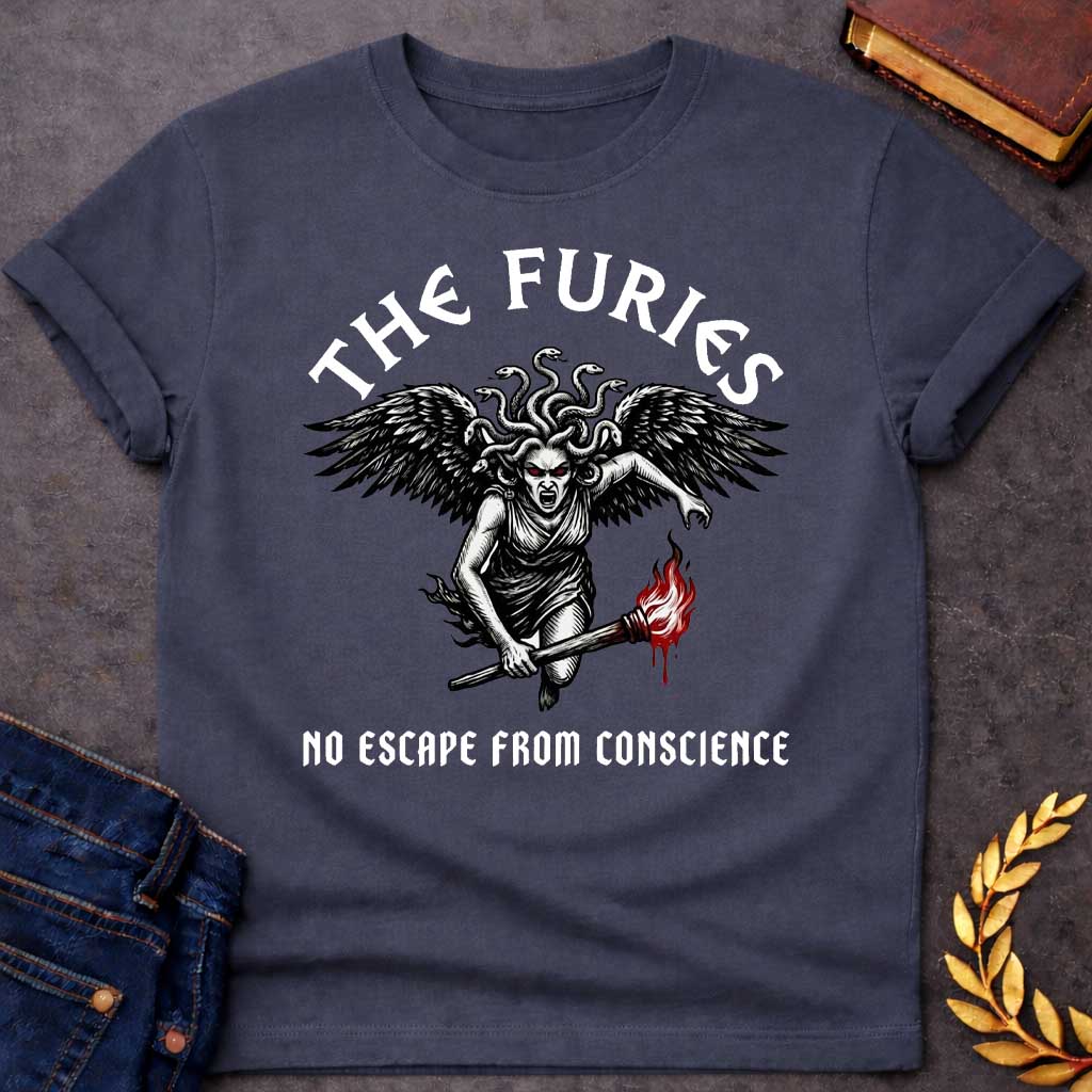 Dark Heather T-shirt with a Dramatic illustration of the Furies, the Greek goddesses of vengeance and punishment. A winged female figure with serpents for hair and red glowing eyes holds a flaming torch. Bold black engraving style with red flame accents. Large dark wings extend from her back, and her expression is fierce and angry. Text reads 'THE FURIES' above and 'NO ESCAPE FROM CONSCIENCE' below. References the Erinyes, divine agents of justice pursuing the guilty.
