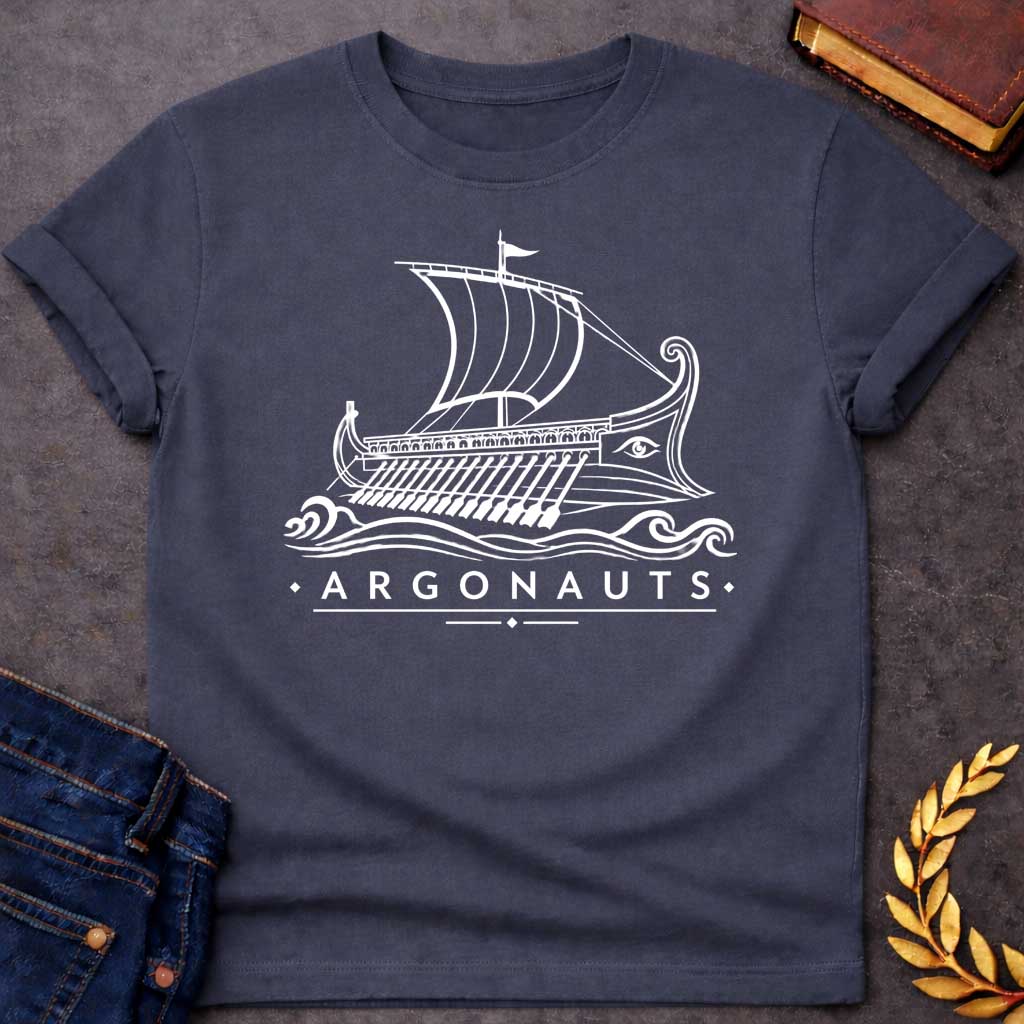 Dark Heather T-shirt with A Classical line art rendering of the legendary Argo in navy blue. The Greek ship features billowing sails above a detailed hull with visible oars. Ornate bow and stern decorations frame a protective eye symbol on the hull. Decorative waves flow beneath. Text reads 'Argonauts' with diamond accents. Celebrates the heroic quest of Jason and his crew seeking the golden fleece in ancient Greek mythology.