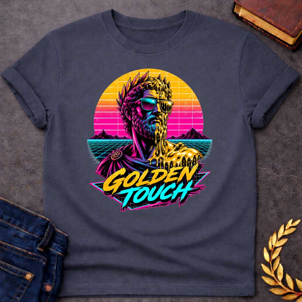 Dark Heather t-shirt with A Retro synthwave-inspired Greek mythology design featuring a stylized bust of King Midas wearing sunglasses as molten gold drips over half his face and shoulder. A vibrant neon sunset, grid landscape, and mountains create an 80s vaporwave backdrop. Bold brush lettering reads "Golden Touch" in gold and teal, using bright pink, purple, cyan, and gold for a striking vintage aesthetic.