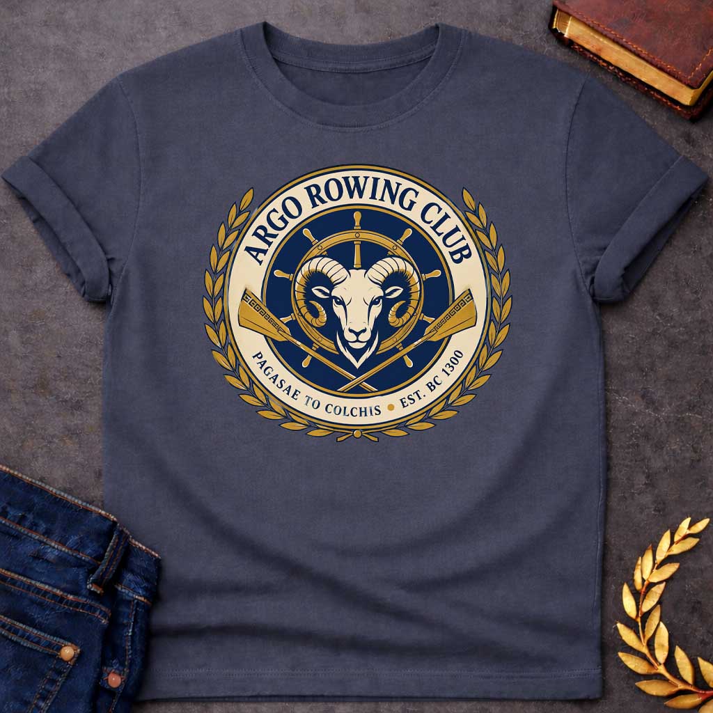 Dark Heather T-shirt with A Nautical emblem of Argo Rowing Club in navy and gold featuring a golden ram's head at center, representing the mythological golden fleece. A ship's wheel rises above, flanked by crossed oars with Greek key patterns. Laurel wreaths frame the circular design. Text reads 'Argo Rowing Club' and 'Pacasae to Colchis Est. BRC 1300.' Celebrates the legendary quest of Jason and the Argonauts with modern rowing club aesthetics and classical maritime imagery.
