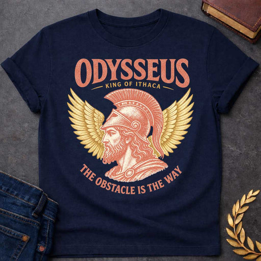 Navy t-shirt with a Vintage Odysseus Greek mythology design featuring the legendary King of Ithaca in profile wearing a classical crested helmet, framed by large golden wings. Distressed terracotta and gold artwork includes the text “Odysseus,” “King of Ithaca,” and “The Obstacle Is the Way,” inspired by The Odyssey and his legendary journey home.