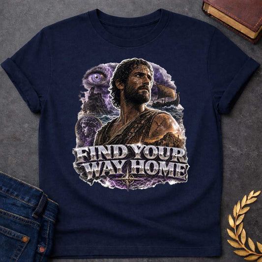 Navy t-shirt with an Epic Greek mythology design featuring Odysseus against a stormy seascape with lightning, a sailing ship, ancient ruins, and a mysterious watchful eye. A portrait of a woman appears within the dramatic collage, symbolizing his journey back to Ithaca. Bold metallic lettering reads "Find Your Way Home," capturing the adventure and perseverance of The Odyssey.