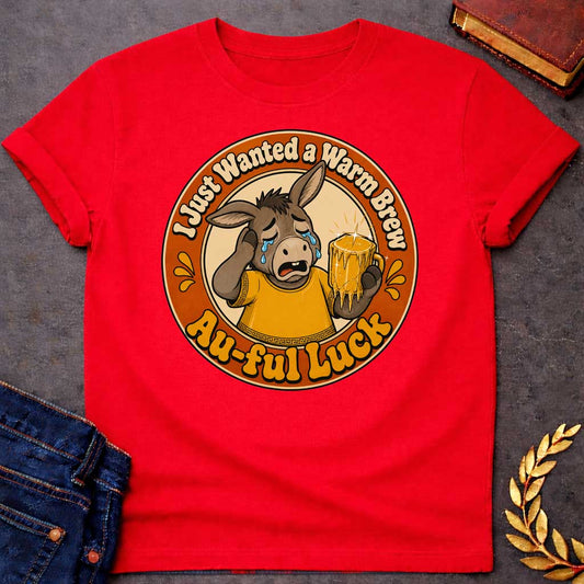Red t-shirt with A Funny Greek mythology design featuring a crying cartoon donkey wearing a gold ancient Greek tunic and holding a dripping gold beer mug. Circular vintage badge layout with the humorous text, "I Just Wanted a Warm Brew" at the top and "Au-ful Luck" at the bottom, referencing the myth of King Midas. Retro orange, gold, cream, and brown color palette with bold, distressed vintage styling.