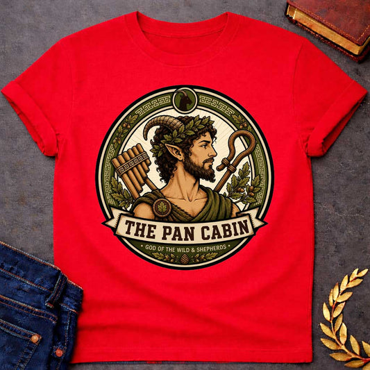 Red t-shirt with a Pan Greek mythology cabin design featuring the god of the wild and shepherds with curved goat horns, pointed ears, leafy crown, and rustic robes. Surrounded by panpipes, a shepherd’s crook, oak leaves, acorns, and Greek key details in an earthy green and gold circular emblem. Text reads “The Pan Cabin” and “God of the Wild & Shepherds,”