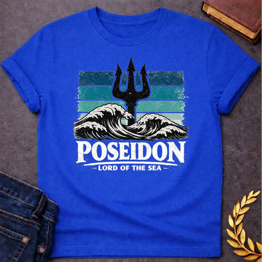 Royal Blue T-Shirt A vintage-style graphic design. The central image features a distressed, black silhouette of a trident rising from the center of crashing, white-capped ocean waves. Behind the trident is a square background made of horizontal stripes in shades of blue, teal, and light seafoam, all with a heavily weathered and grainy texture. Below the waves, the name "POSEIDON" is written in large, bold, white distressed block letters. Underneath the name, the title "— LORD OF THE SEA —" is display