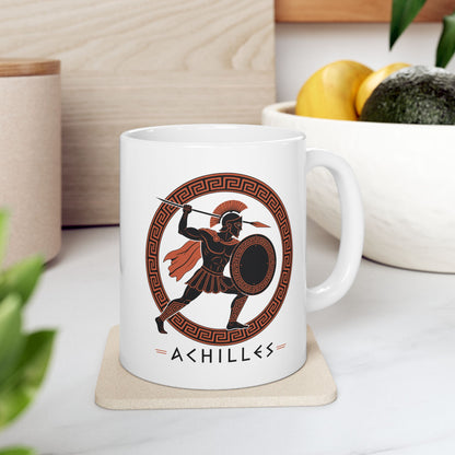 White ceramic mug with a Ancient Greek pottery-style illustration of Achilles, the legendary Trojan War hero, in terracotta orange and black. The warrior wears a crested Corinthian helmet, pleated skirt, and flowing cape while raising a spear in dynamic battle pose. He holds a round shield with Greek key pattern. Enclosed in a circular meander pattern border. The name 'ACHILLES' appears below in geometric letters. Celebrates the hero's legendary martial strength.