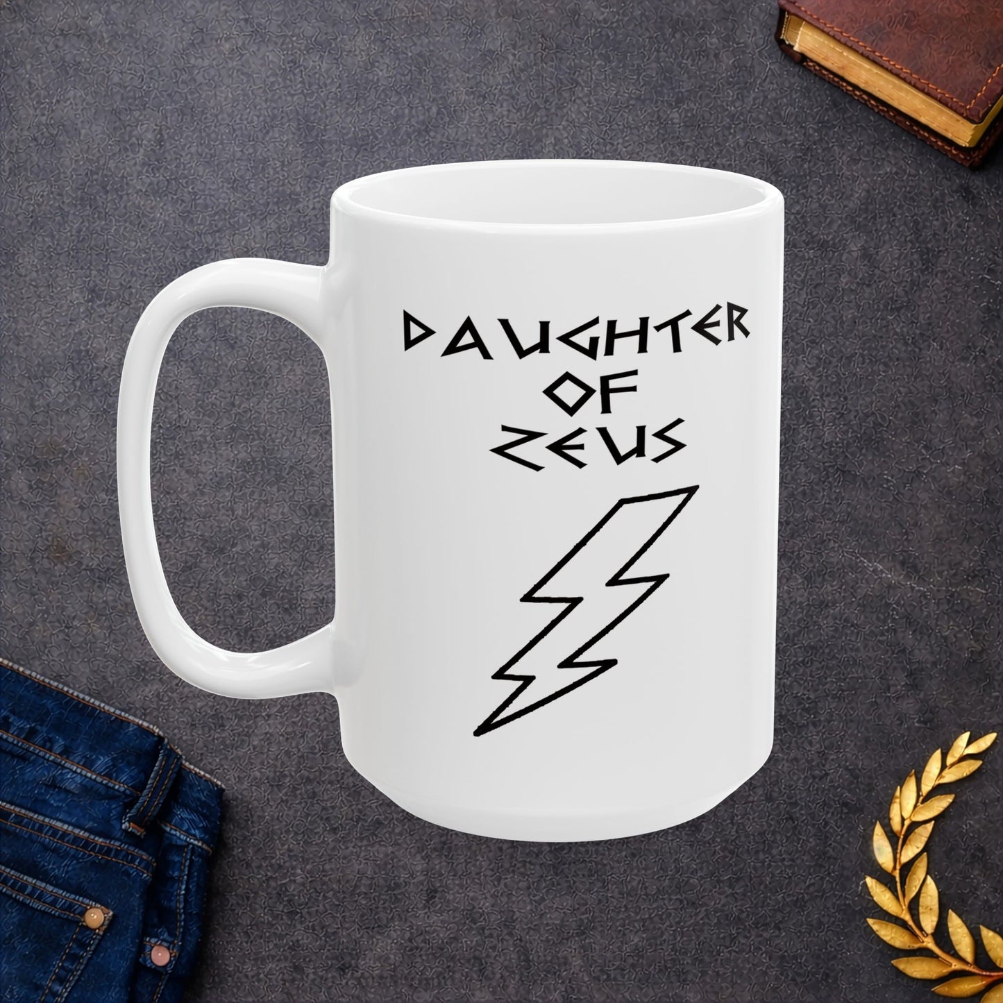 A minimalist black graphic for a white ceramic mug featuring a large, central outline of a lightning bolt. Above the bolt, the text "DAUGHTER OF ZEUS" is written in a sharp, angular font inspired by ancient Greek inscriptions. The entire design is rendered in a clean, high-contrast black outline style.