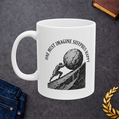Philosophical engraving-style illustration on a ceramic mug depicting Sisyphus pushing a massive boulder up an inclined slope. Black and white line work shows the muscular figure in eternal struggle against gravity. Text curves around the image reading 'One Must Imagine Sisyphus Happy,' referencing Albert Camus's essay on absurdism. Celebrates the philosophical concept of finding meaning and happiness within repetitive, seemingly futile tasks. Profound meditation on human resilience and existential meaning.