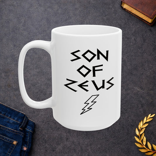 A minimalist black graphic for a white ceramic mug featuring a large, central outline of a lightning bolt. Above the bolt, the text "SON OF ZEUS" is written in a sharp, angular font inspired by ancient Greek inscriptions. The entire design is rendered in a clean, high-contrast black outline style.