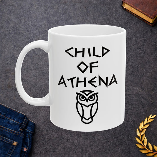 White ceramic mug graphic featuring bold ancient Greek-style lettering reading "Child of Athena" above a clean geometric line-art owl icon — referencing Athena, the Greek Goddess of Wisdom, whose sacred symbol is the owl, rendered in white on black in a striking high-contrast design.