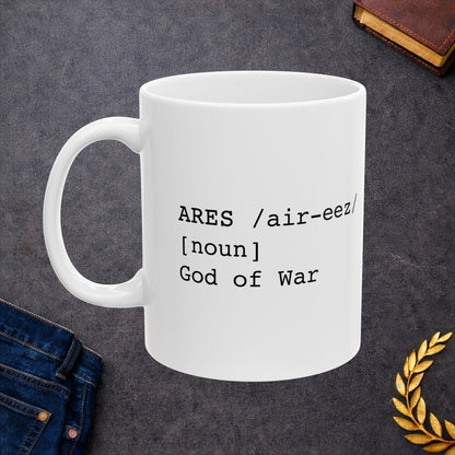 White ceramic mug featuring a dictionary-style definition graphic in black text on a white background. The text reads: 'ARES /air-eez/ [noun] God of War.