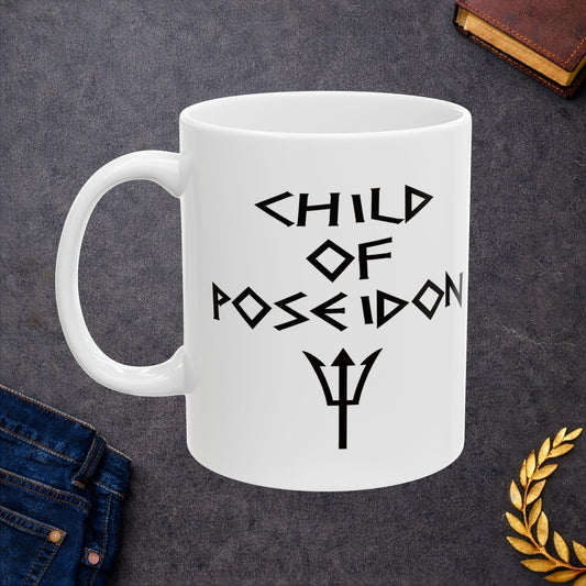 A minimalist black graphic for a white ceramic mug featuring a central silhouette of a trident. Above the trident, the text "CHILD OF POSEIDON" is written in a sharp, angular font reminiscent of ancient Greek epigraphy. The entire design is rendered in a clean, high-contrast black style.