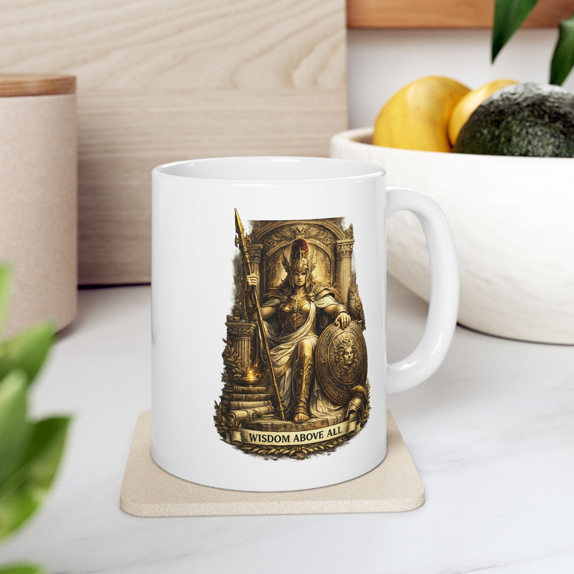 Classical engraving-style illustration of Athena, Greek goddess of wisdom, on a white ceramic mug. She wears ornate gold armor with a winged helmet and holds a spear. Her shield displays a Medusa head. She's seated within an elaborate golden temple with Corinthian columns. A torch glows at the base. Laurel wreath adorns the bottom. Text reads 'Wisdom Above All.' Golden, cream, and earth-tone palette celebrates the divine patron of wisdom, strategy, and warfare in ancient mythology.