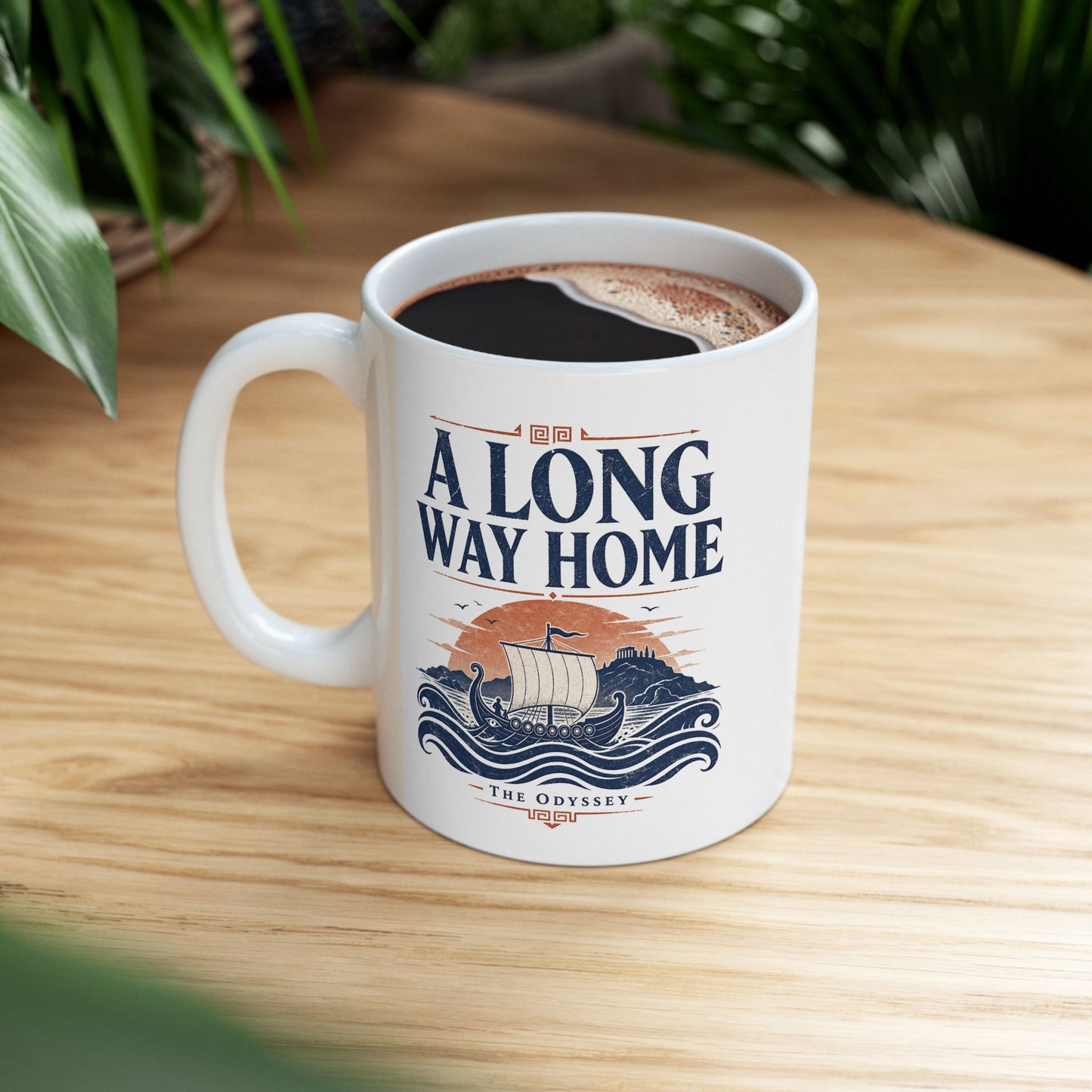 White ceramic mug with a Vintage Greek mythology  design inspired by The Odyssey, featuring an ancient Greek ship sailing across rolling blue waves toward a distant island and temple beneath a terracotta sunset. Bold distressed text reads "A Long Way Home," with "The Odyssey" below, symbolizing Odysseus' legendary journey back to Ithaca.