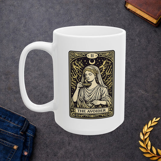 White ceramic mug with a gold and black tarot card-style illustration titled "THE AVOIDER," featuring Hestia from Greek mythology. It depicts the goddess in serene draped robes calmly sipping from a steaming cup, staying unfazed by a chaotic background of stormy clouds, lightning bolts, and tridents. The card includes ornate borders, a crescent moon, and the Roman numeral "II" at the top, creating a humorous, mystical aesthetic.