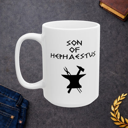 A minimalist black graphic for a white ceramic mug. The design features a central silhouette of a blacksmith's anvil with a hammer and tongs crossed behind it. Above the tools, the text "SON OF HEPHAESTUS" is written in a sharp, angular font inspired by ancient Greek inscriptions. The entire illustration is rendered in a clean, solid black style.