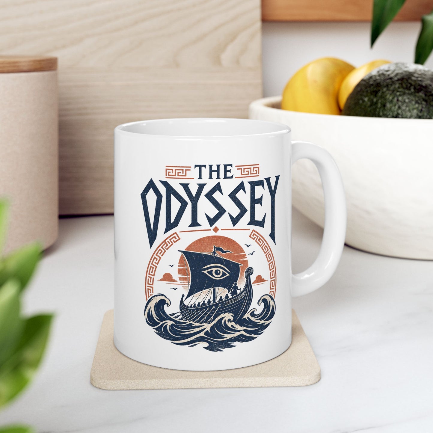 White ceramic mug with a Vintage Greek mythology white ceramic mug design inspired by The Odyssey, featuring Odysseus and his crew sailing an ancient Greek ship through powerful blue waves beneath a terracotta sunset. A watchful eye decorates the sail, framed by Greek key motifs and bold distressed "The Odyssey" lettering.
