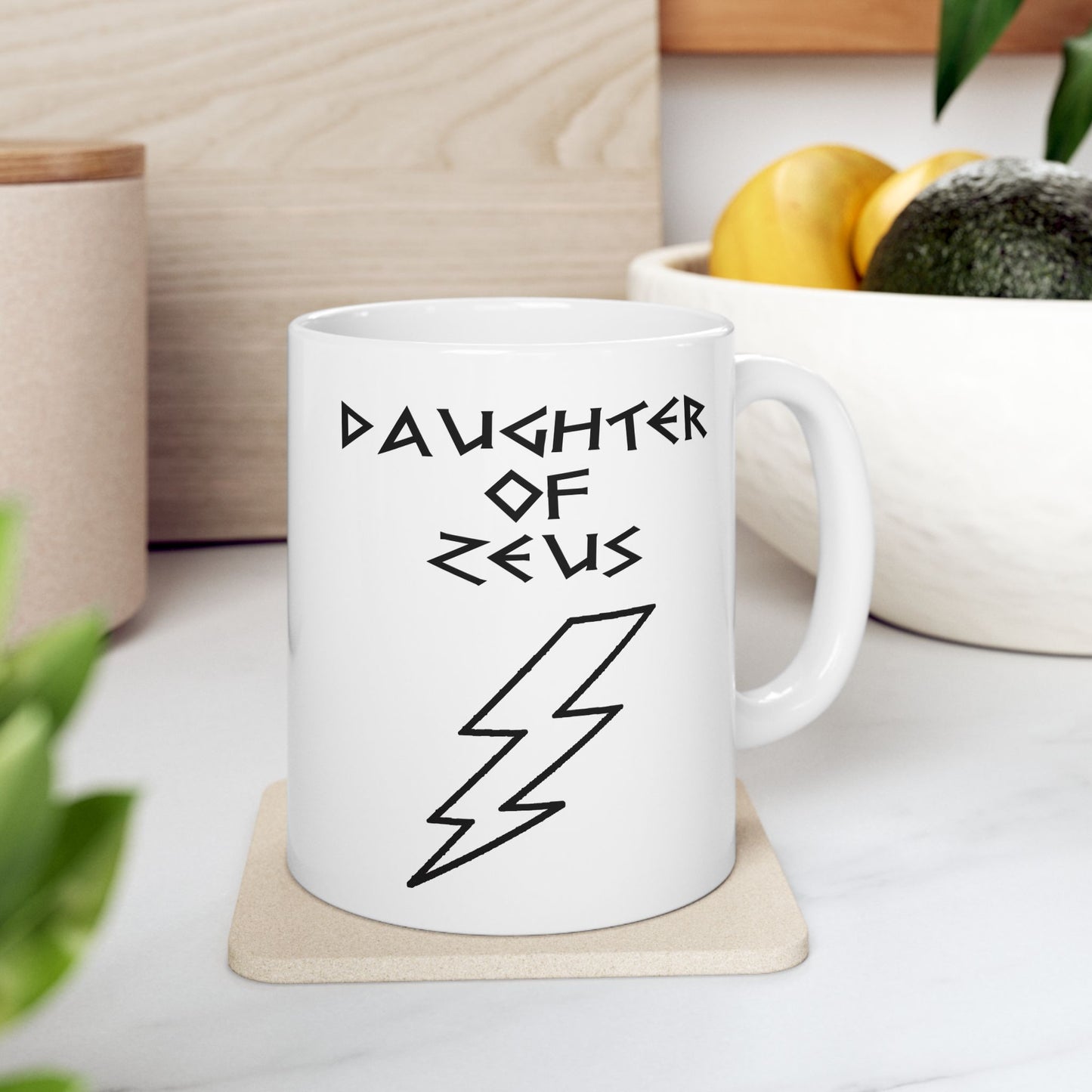 A minimalist black graphic for a white ceramic mug featuring a large, central outline of a lightning bolt. Above the bolt, the text "DAUGHTER OF ZEUS" is written in a sharp, angular font inspired by ancient Greek inscriptions. The entire design is rendered in a clean, high-contrast black outline style.