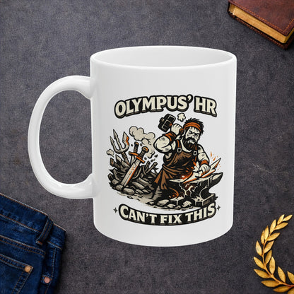 White ceramic mug with a humorous, gritty black-and-orange illustration of the Greek god Hephaestus working furiously at his anvil. He raises a heavy blacksmith hammer to forge a jagged bolt of lightning amidst flying sparks. A chaotic pile of broken swords and tridents rests behind him. Arching text above and below the scene reads "OLYMPUS' HR CAN'T FIX THIS" in a bold, rugged cream font.