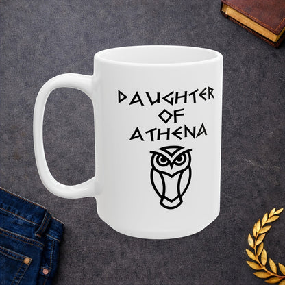 White ceramic mug graphic featuring bold ancient Greek-style lettering reading "Daughter of Athena" above a clean geometric line-art owl icon — referencing Athena, the Greek Goddess of Wisdom, whose sacred symbol is the owl, rendered in white on black in a striking high-contrast design.