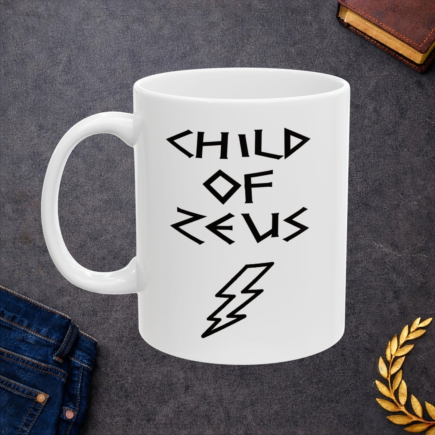A minimalist black graphic for a white ceramic mug featuring a large, central outline of a lightning bolt. Above the bolt, the text "CHILD OF ZEUS" is written in a sharp, angular font inspired by ancient Greek inscriptions. The entire design is rendered in a clean, high-contrast black outline style.