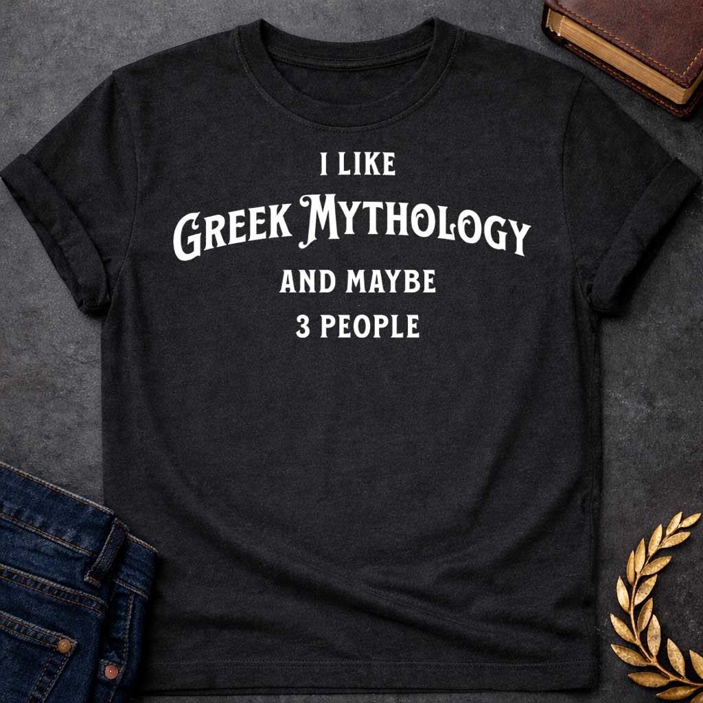 Black t-shirt with A Minimalist typography Greek mythology t-shirt design featuring bold white text that reads, "I Like Greek Mythology and Maybe 3 People." The playful layout uses a mix of vintage-inspired serif and decorative lettering with strong visual hierarchy, creating a humorous design for mythology enthusiasts with an introverted sense of humor.