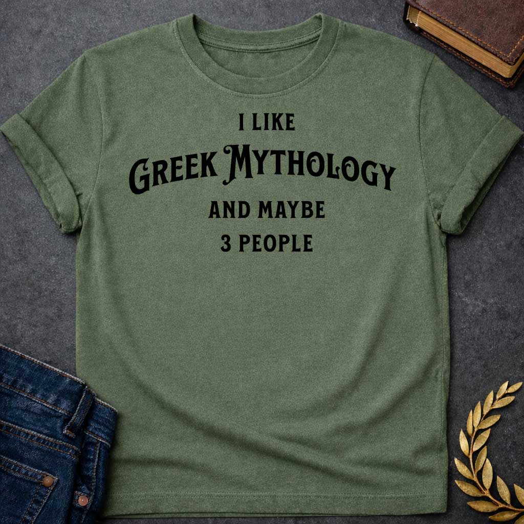 Military Green t-shirt with A Minimalist typography Greek mythology t-shirt design featuring bold black text that reads, "I Like Greek Mythology and Maybe 3 People." The playful layout uses a mix of vintage-inspired serif and decorative lettering with strong visual hierarchy, creating a humorous design for mythology enthusiasts with an introverted sense of humor.