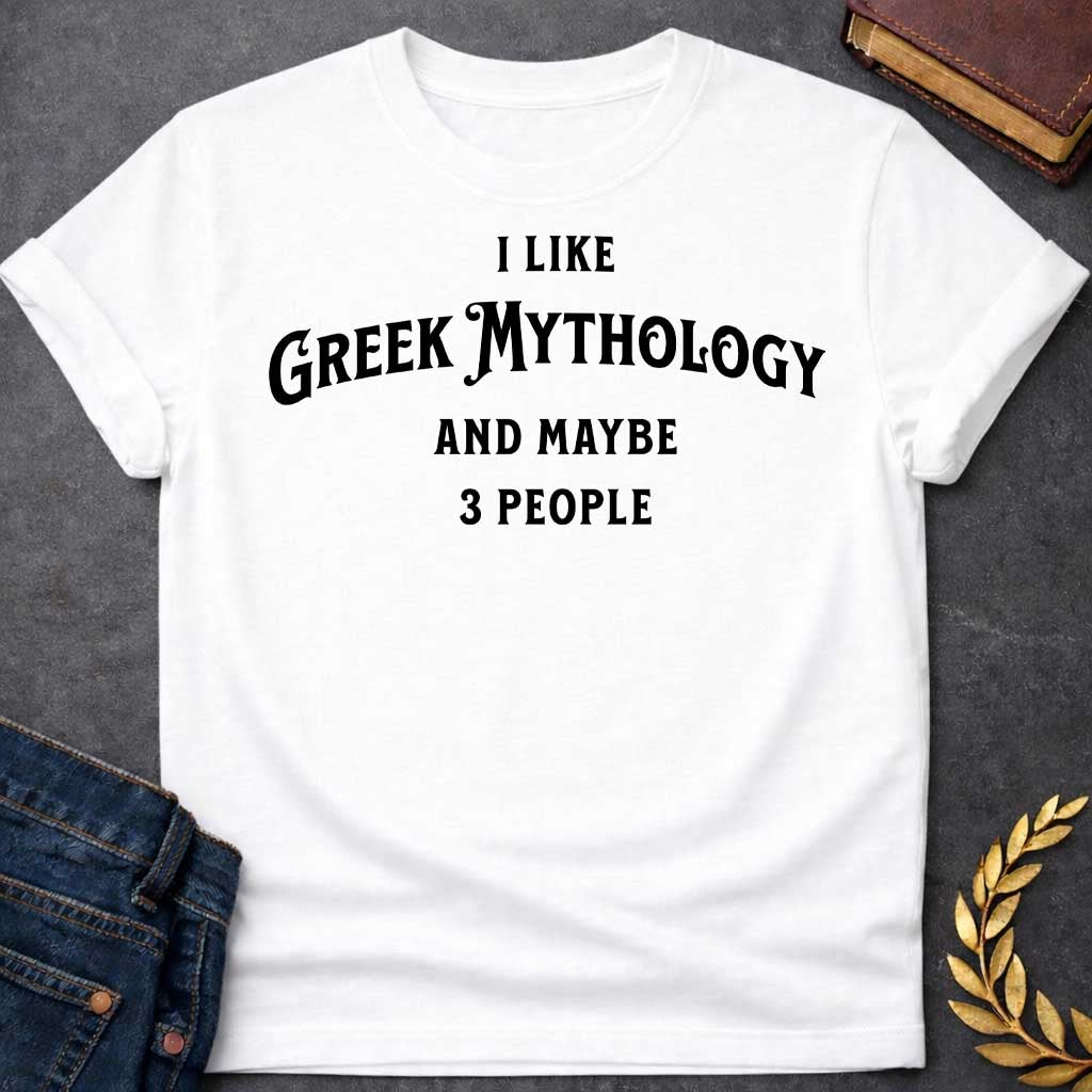 White t-shirt with A Minimalist typography Greek mythology t-shirt design featuring bold black text that reads, "I Like Greek Mythology and Maybe 3 People." The playful layout uses a mix of vintage-inspired serif and decorative lettering with strong visual hierarchy, creating a humorous design for mythology enthusiasts with an introverted sense of humor.