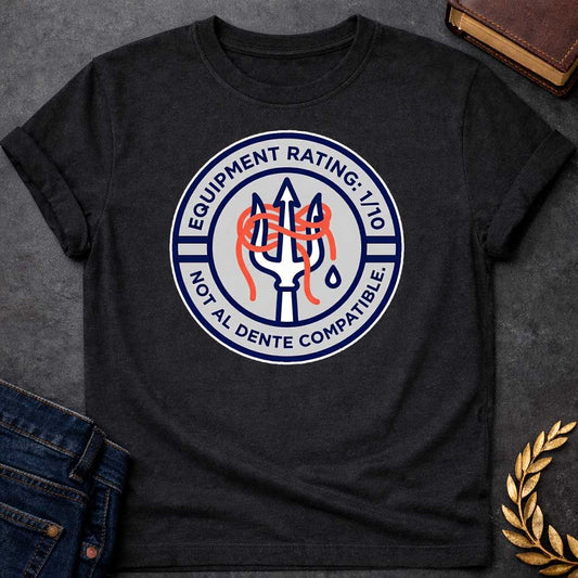 Black T-Shirt A circular patch-style graphic design. The design features a light gray inner circle surrounded by a thick navy blue border.  In the center, a white trident outlined in navy blue has a tangle of bright orange spaghetti coiled around its tines. A single blue water droplet sits to the right of the trident's handle.  The top half of the navy border contains the white text: "EQUIPMENT RATING: 1/10".  The bottom half of the border contains the white text: "NOT AL DENTE COMPATIBLE."  The entire embl