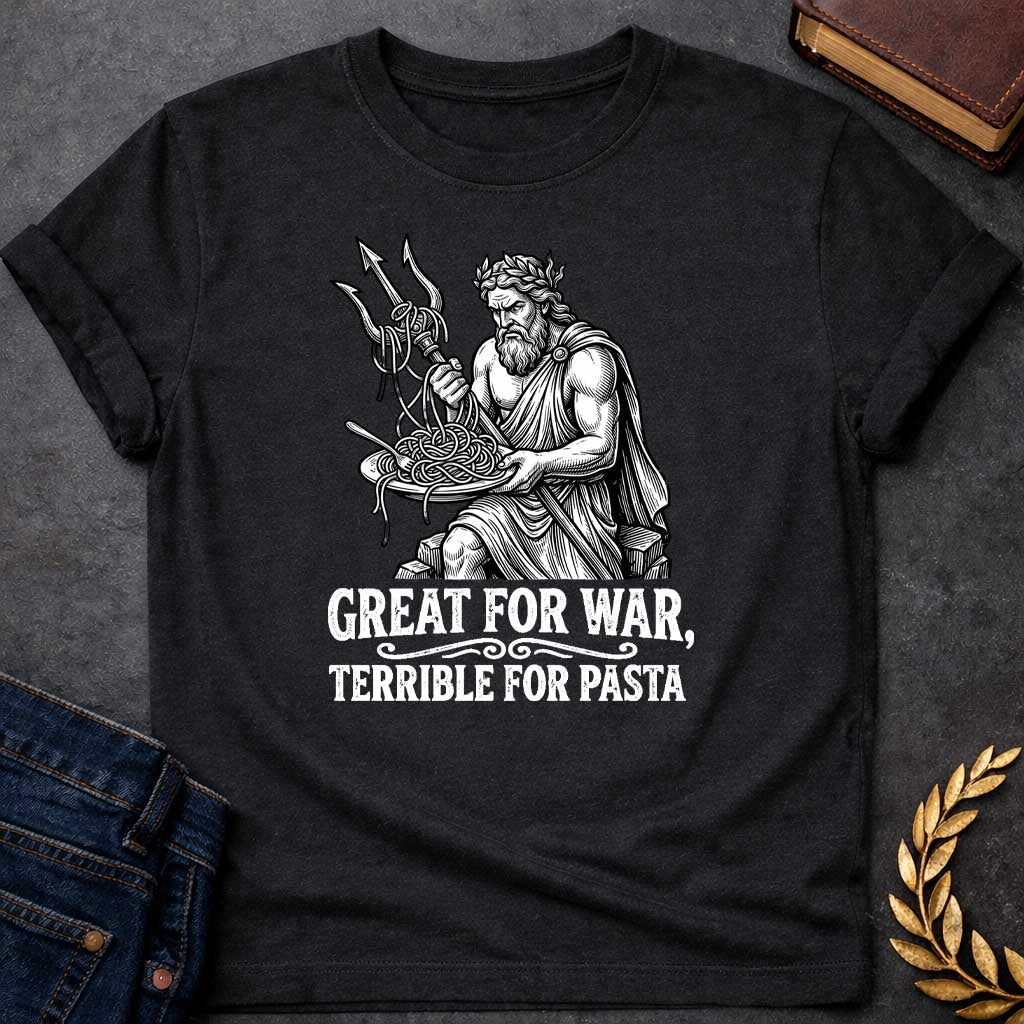 Black T-shirt graphic in black and white featuring a detailed engraving-style illustration of Poseidon seated on rocks wearing a laurel wreath and draped robe, holding a trident in one hand with spaghetti tangled around its prongs, while balancing a plate of pasta in his other hand and looking frustrated. Bold distressed white text below with decorative scroll divider reads "Great for War, Terrible for Pasta" — a humorous nod to Poseidon, the Greek God of the Sea