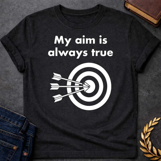 Black T-shirt graphic At the top, the phrase "My aim is always true" is written in a bold, white, sans-serif font across two lines. Below the text is a black and white bullseye target icon. Three white arrows are shown striking the center of the target simultaneously from the left, with their points clustered directly in the "dead center" inner circle