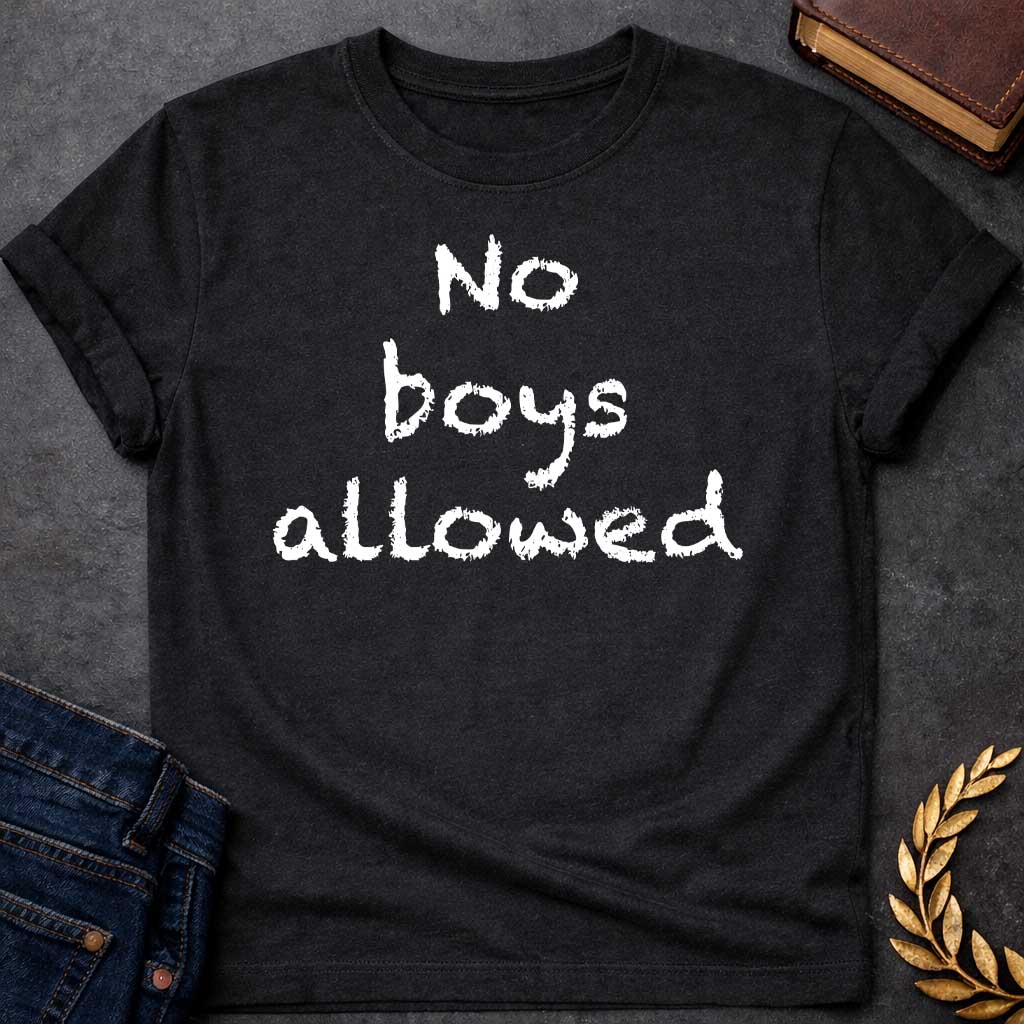 Black T-shirt graphic in white text featuring rough hand-carved or bark-textured text reading "No boys allowed" a humorous nod to Artemis, the Greek Goddess of the Hunt and sworn virgin goddess who famously rejected male company