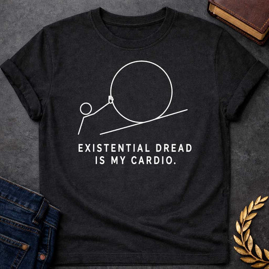 Black T-Shirt with a minimalist white graphic design. It features a simple line-art illustration of a stick figure pushing a large circle up a diagonal line, depicting a humorous take on the myth of Sisyphus. Below the illustration, the white text reads: "EXISTENTIAL DREAD IS MY CARDIO."