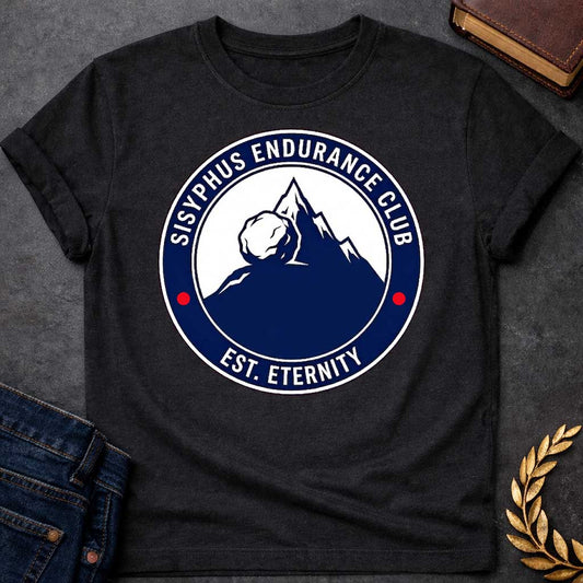 Black T-Shirt with a circular, emblem-style graphic design. The center features a dark blue silhouette of a mountain with a large boulder resting near the peak. Surrounding this illustration is a dark blue ring with white text that reads "SISYPHUS ENDURANCE CLUB" arched at the top and "EST. ETERNITY" at the bottom, with two small red dots separating the text on the sides.