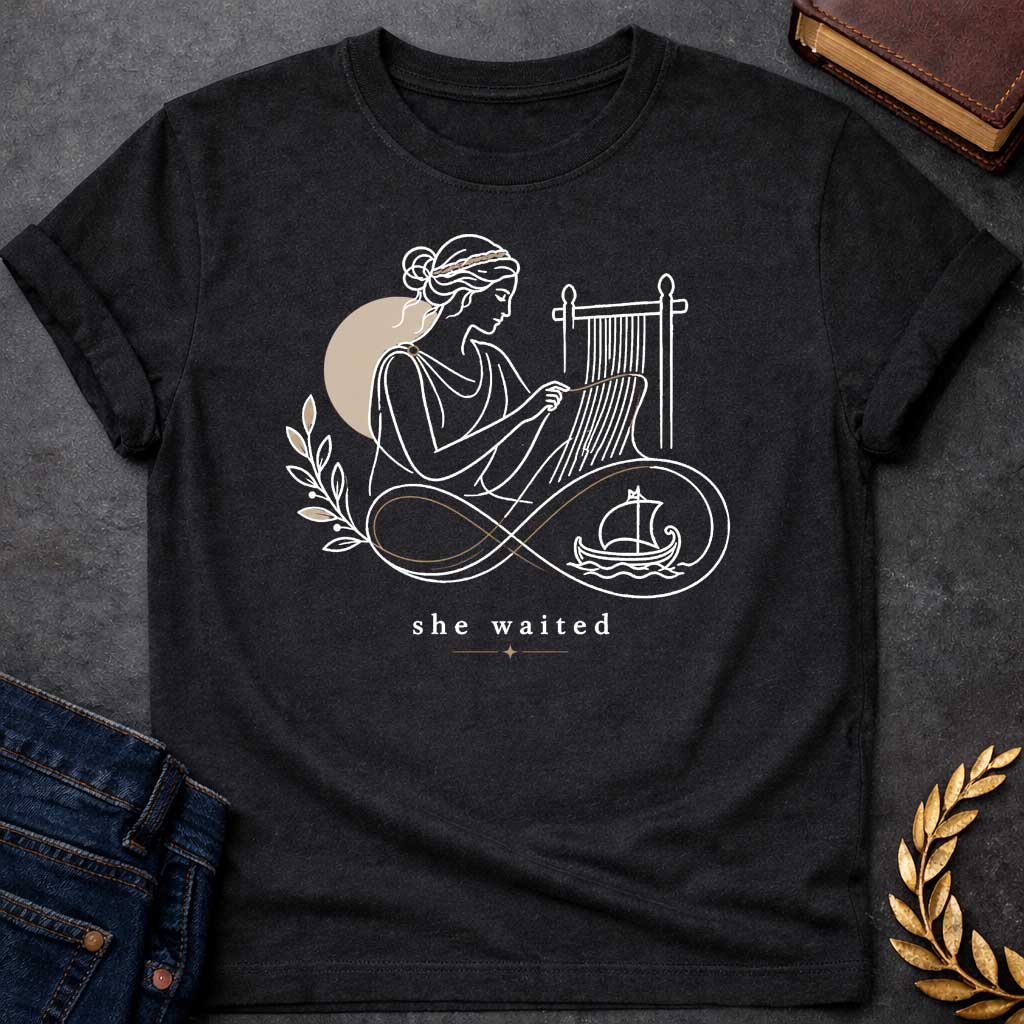 Black T-Shirt with a Minimalist line art of Penelope weaving at a loom, wearing classical Greek robes with braided hair. Rendered in elegant black linework with tan accents. An infinity symbol flows from the loom, incorporating an olive branch and Greek ship, symbolizing endless waiting for Odysseus. Text reads 'she waited' in serif font with decorative star. Gentle design honoring Penelope's faithful devotion and patience during her husband's 20-year absence.