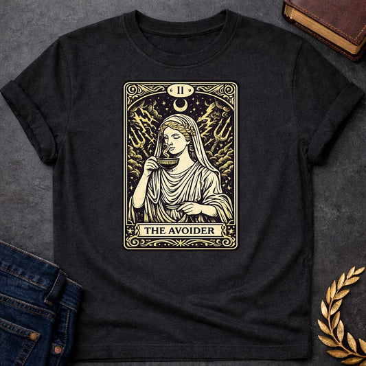Black T-shirt design in the style of a vintage tarot card. It features a woman in classical Greek robes calmly sipping from a cup. Behind her, lightning strikes and two tridents emerge from turbulent clouds under a crescent moon. The card is labeled with Roman numeral "II" at the top and the text "THE AVOIDER" in a banner at the bottom, all rendered in a cream and black woodcut aesthetic.