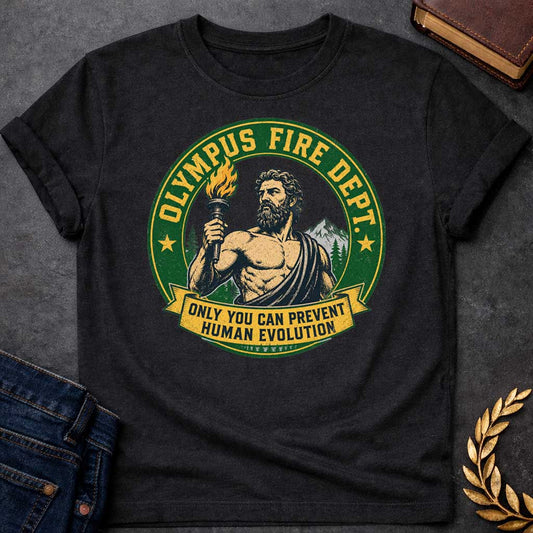 Black T-shirt with A satirical national park style badge featuring Prometheus or Zeus holding a burning torch. The central vector portrait is set against mountains and pine trees. A distressed green circular frame reads "OLYMPUS FIRE DEPT." in a bold yellow font flanked by two stars. A yellow banner draped across the bottom features the humorous tagline: "ONLY YOU CAN PREVENT HUMAN EVOLUTION" in clean block letters.