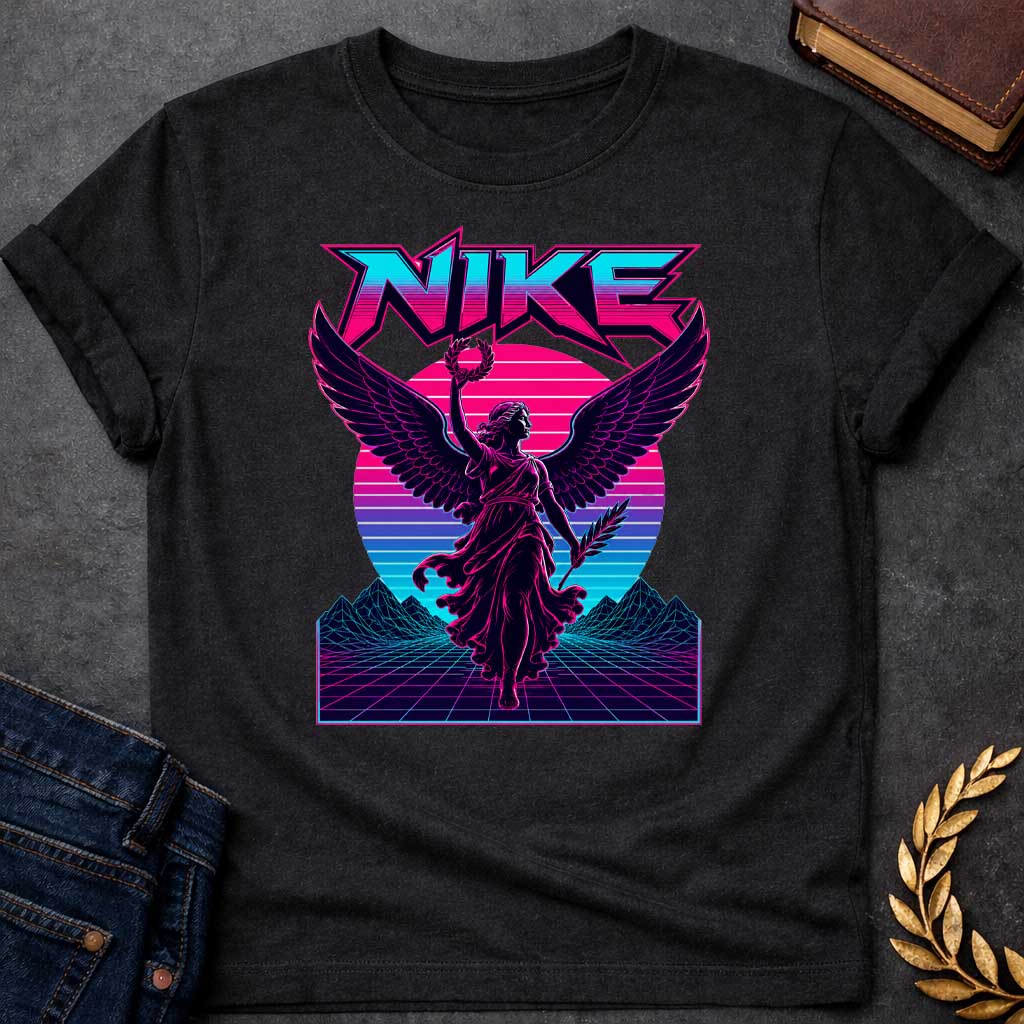 Black T-shirt with a Vaporwave-style illustration of Nike, the Greek goddess of victory, rendered in neon magenta and cyan. She wears flowing robes with large detailed wings, holding a laurel wreath and palm frond. Bold angular text 'NIKE' appears above in magenta lettering. Geometric mountains and grid landscape create a synthwave aesthetic. Horizontal gradient bands in magenta, purple, and cyan evoke 1980s digital design. Blends classical mythology with modern vaporwave art.