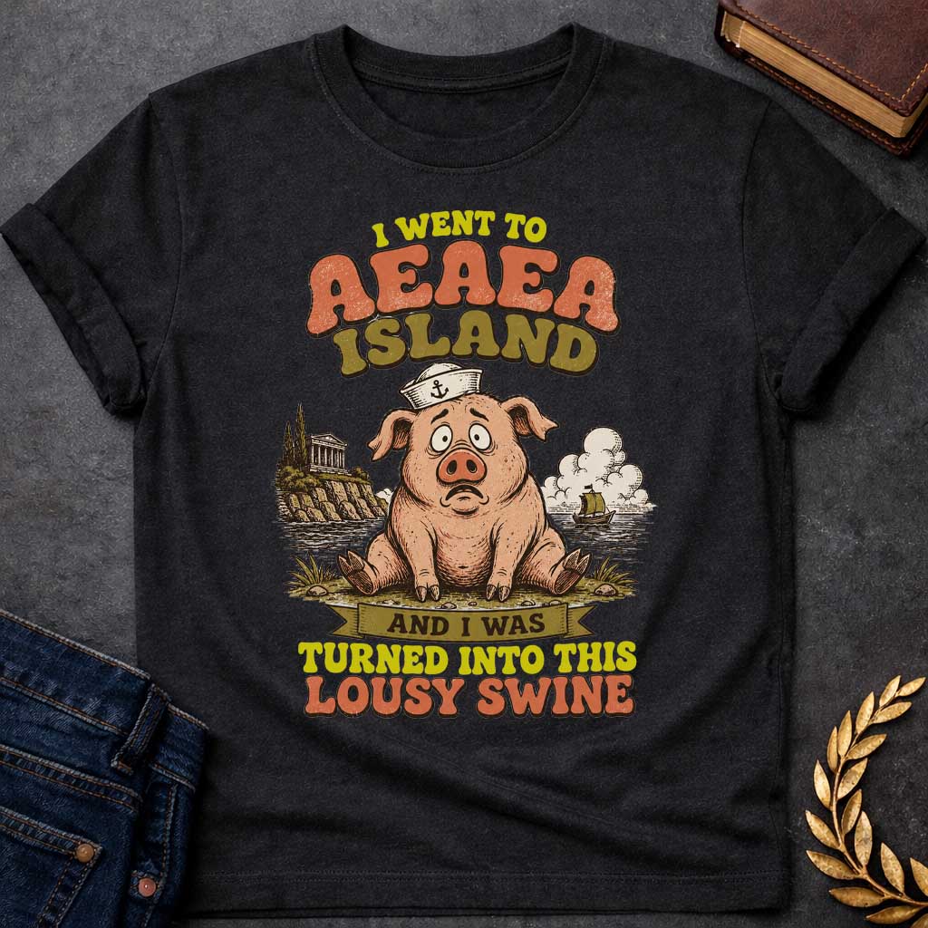 Black T-shirt with a A humorous, retro souvenir-style t-shirt design. A worried cartoon pig wearing a sailor hat sits on a shore, with an ancient Greek temple on a cliff and a ship at sea behind it. Playful, distressed text reads "I WENT TO AEAEA ISLAND" at the top, and "AND I WAS TURNED INTO THIS LOUSY SWINE" at the bottom, using a vintage color palette of muted orange, green, and yellow.
