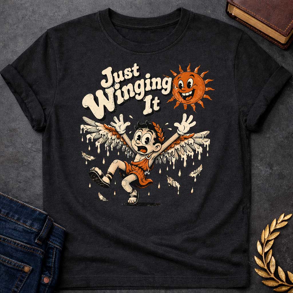 Black t-shirt with a vintage 1930s rubber-hose cartoon style  design. A panicked boy representing Icarus tumbles through the air with arms raised as his feathered wax wings melt into dripping drops. Above him, a cheerful retro sun character grins mischievously next to playful, bubbly text that reads "Just Winging It" in a distressed cream font.