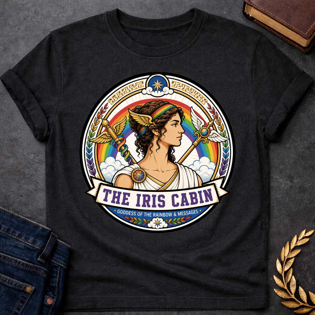Black t-shirt with a Iris Greek mythology cabin design featuring the goddess of the rainbow and messages in a colorful circular emblem. Iris wears a rainbow headband and winged accents, surrounded by a vibrant rainbow, clouds, winged staffs, laurel leaves, and celestial details. Text reads “The Iris Cabin” and “Goddess of the Rainbow & Messages,”