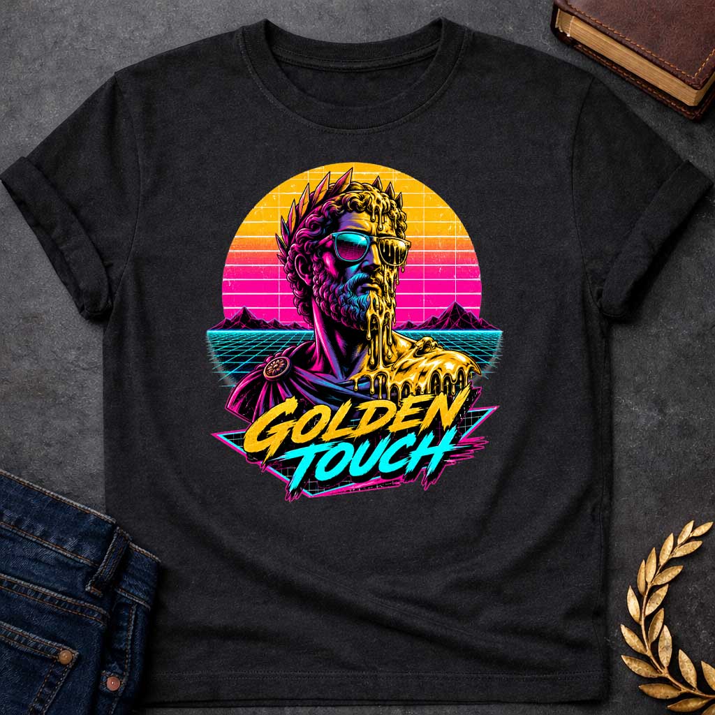 Black t-shirt with A Retro synthwave-inspired Greek mythology design featuring a stylized bust of King Midas wearing sunglasses as molten gold drips over half his face and shoulder. A vibrant neon sunset, grid landscape, and mountains create an 80s vaporwave backdrop. Bold brush lettering reads "Golden Touch" in gold and teal, using bright pink, purple, cyan, and gold for a striking vintage aesthetic.