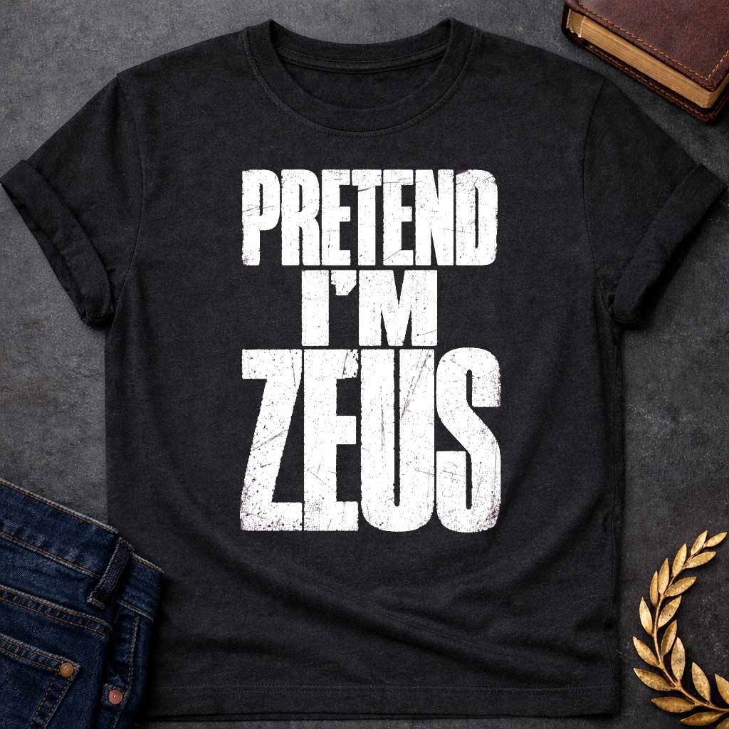 Black t-shirt with a Pretend I’m Zeus Greek mythology design featuring bold distressed White typography on a transparent background. The stacked text reads “PRETEND I’M ZEUS” in a rugged vintage block font, creating a humorous design inspired by Zeus, king of the Greek gods and god of the sky, thunder, and lightning.