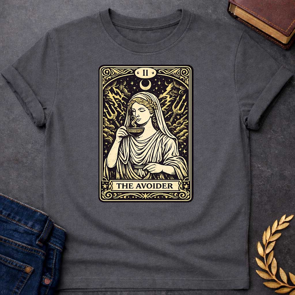 Charcoal T-shirt design in the style of a vintage tarot card. It features a woman in classical Greek robes calmly sipping from a cup. Behind her, lightning strikes and two tridents emerge from turbulent clouds under a crescent moon. The card is labeled with Roman numeral "II" at the top and the text "THE AVOIDER" in a banner at the bottom, all rendered in a cream and black woodcut aesthetic.
