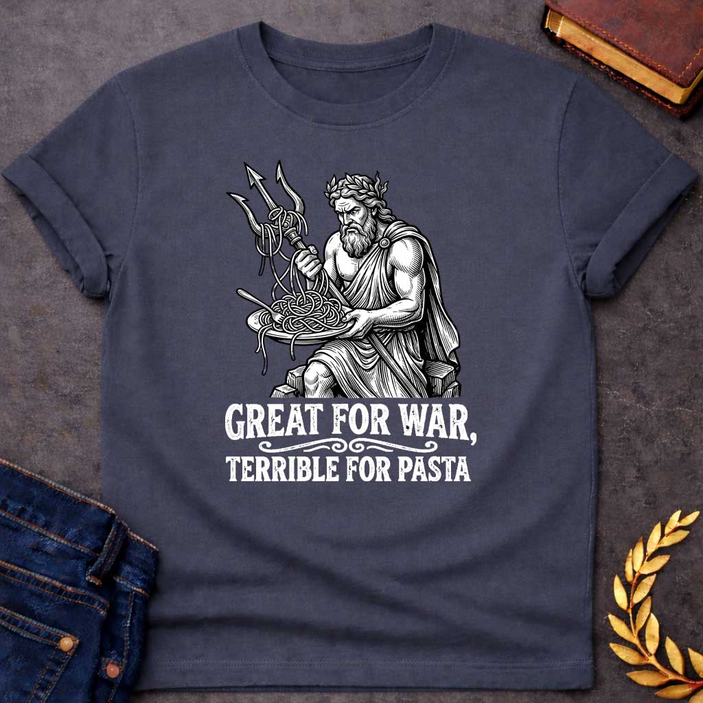 Dark Heather T-shirt graphic in black and white featuring a detailed engraving-style illustration of Poseidon seated on rocks wearing a laurel wreath and draped robe, holding a trident in one hand with spaghetti tangled around its prongs, while balancing a plate of pasta in his other hand and looking frustrated. Bold distressed white text below with decorative scroll divider reads "Great for War, Terrible for Pasta" — a humorous nod to Poseidon, the Greek God of the Sea