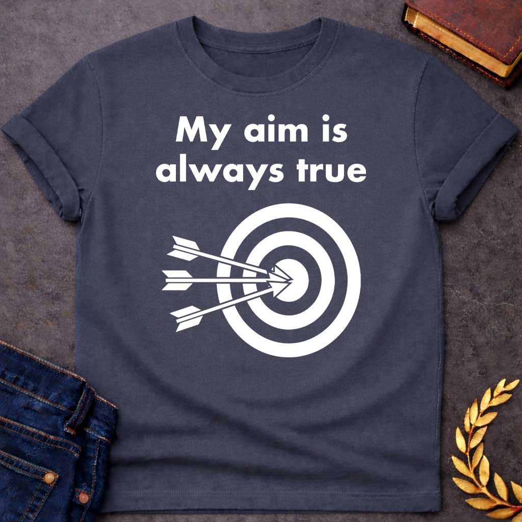 Dark Heather T-shirt graphic At the top, the phrase "My aim is always true" is written in a bold, white, sans-serif font across two lines. Below the text is a black and white bullseye target icon. Three white arrows are shown striking the center of the target simultaneously from the left, with their points clustered directly in the "dead center" inner circle